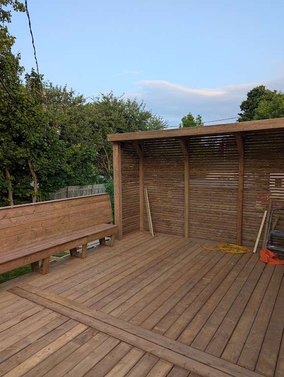 Cedar deck with slat-screen pergola